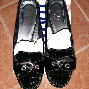 Riva black patent flats